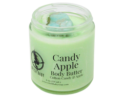 pastel green body butter in 4 oz glass jar with tumbled amazonite on top with clear label that reads: candy apple body butter cotton candy & apple 