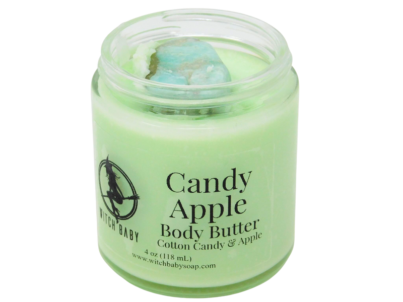 pastel green body butter in 4 oz glass jar with tumbled amazonite on top with clear label that reads: candy apple body butter cotton candy & apple 