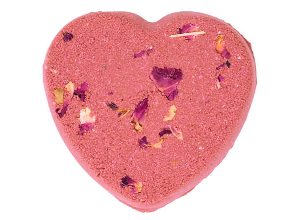 pink heart shaped bath bomb with roses on top