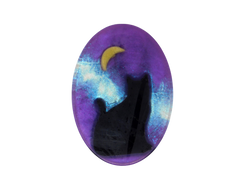 A purple oval shaped soap with a glitter galaxy background and a black cat sitting under a moon