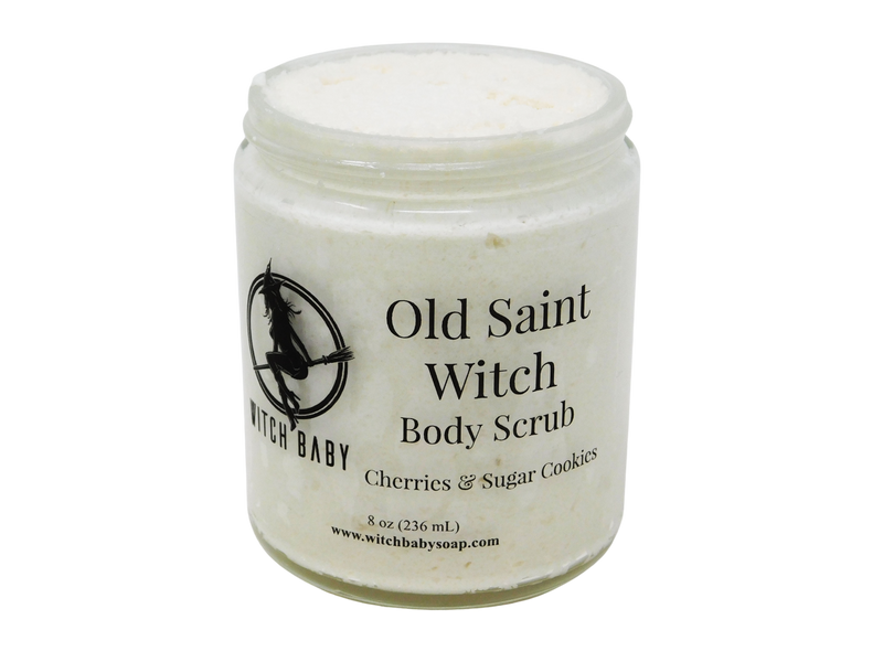 8 oz glass jar filled with thick white shimmery body scrub. Clear label reads: Old Saint Witch Body Scrub. Cherries & Sugar Cookies. 