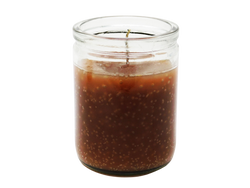 brown candle in glass jar