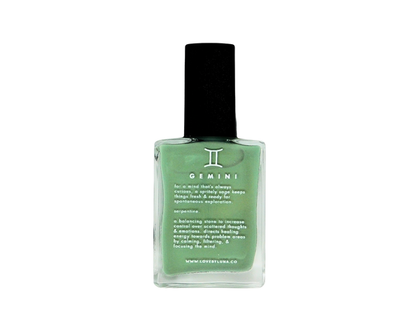 front view of gemini nail polish - polish is leafy green and has the text the description  from this listing written on the front of the bottle