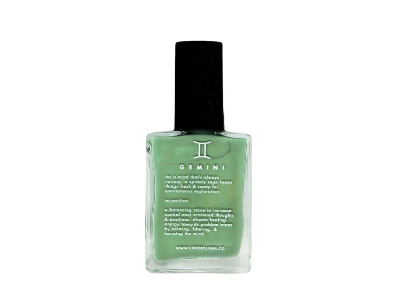 front view of gemini nail polish - polish is leafy green and has the text the description  from this listing written on the front of the bottle