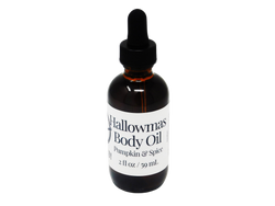 Amber colored 2 oz dropper bottle. Label says Hallowmas Body Oil Pumpkin and Spice