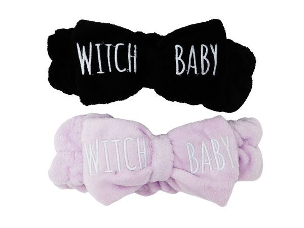 Picture of both black and lavender colored Witch Baby plush headbands.