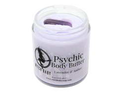 purple body butter in glass jar topped with amethyst crystal with a label that reads: Psychic Body Butter. Lavender - Amber - Vanilla.