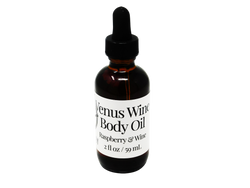 2 oz brown glass dropped bottle with a white label that says Venus Wine. Raspberry & Wine.